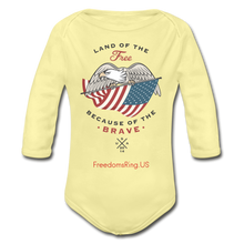 Load image into Gallery viewer, LAND OF THE FREE, BECAUSE OF THE BRAVE - Organic Long Sleeve Baby Bodysuit - washed yellow